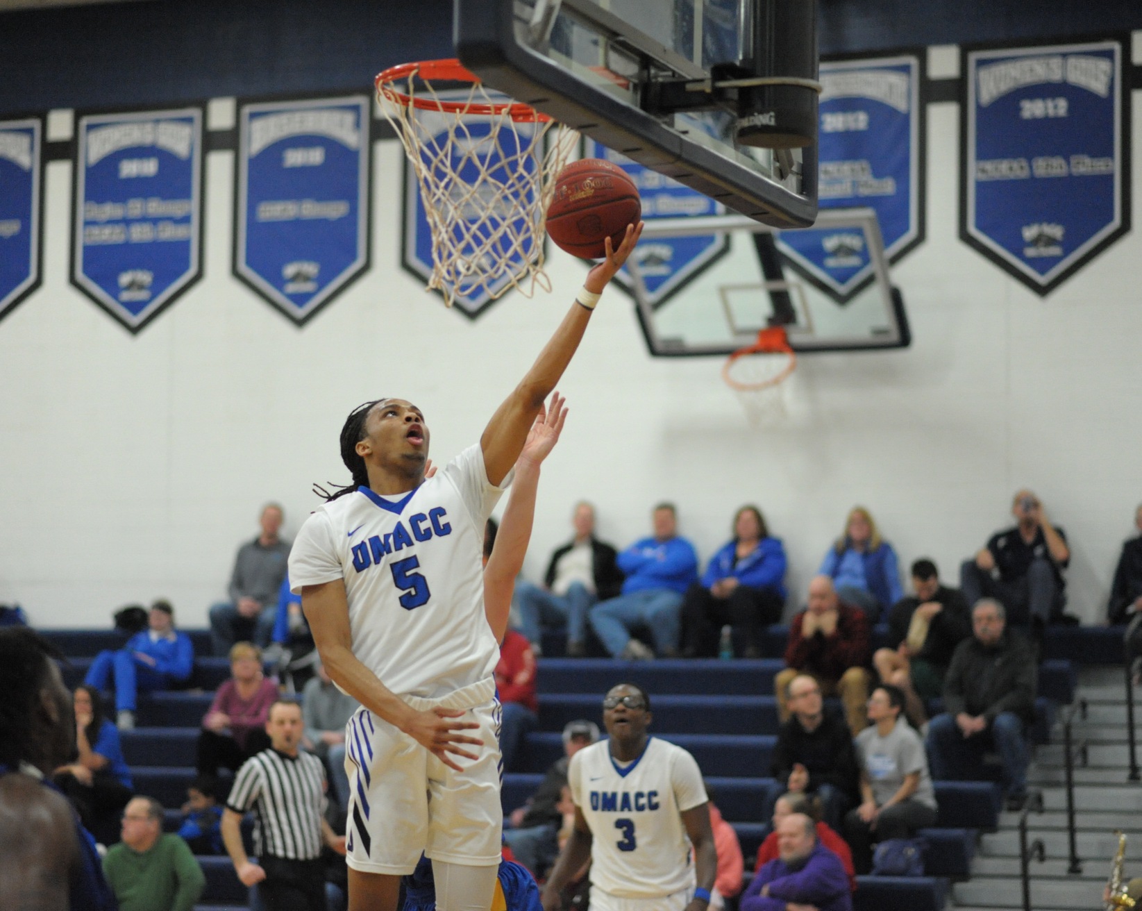 Lee Higgins goes up for layup